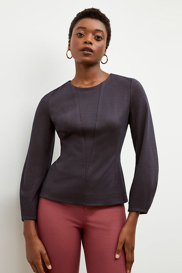 Front image of a woman wearing the rashida top in navy multi | Exclude | Grid