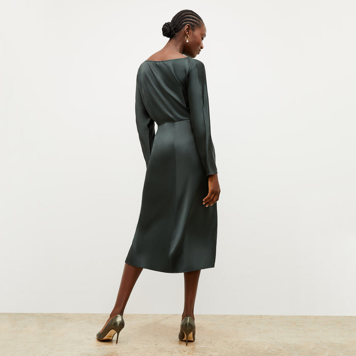 Image of a woman wearing the Rashmeen Dress in Hunter
