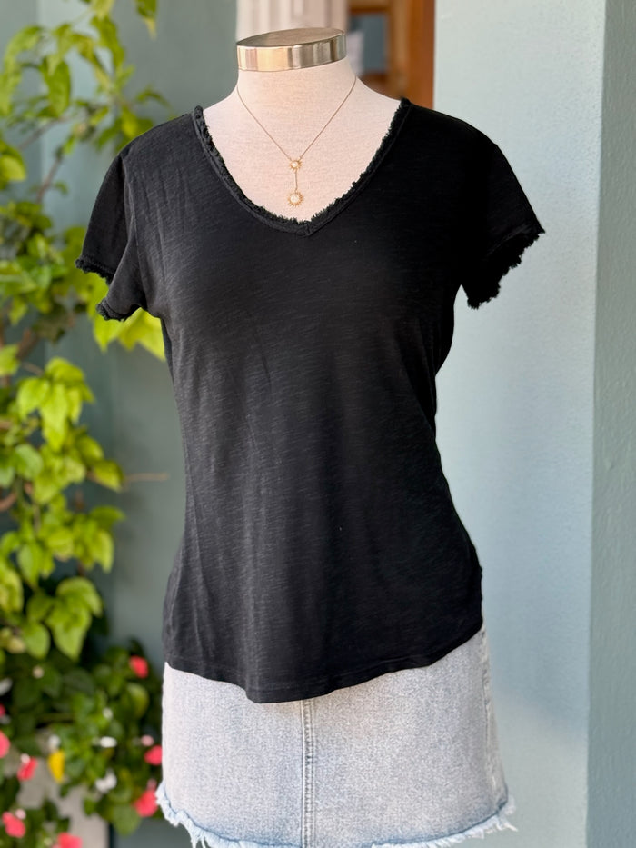 Reece Raw Edge Tee in black on mannequin styled with denim. Made in Italy