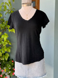 Reece Raw Edge Tee in black on mannequin styled with denim. Made in Italy