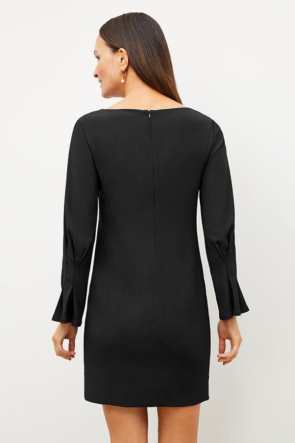 Back image of a woman wearing the regina dress in black | Exclude | Grid Hover