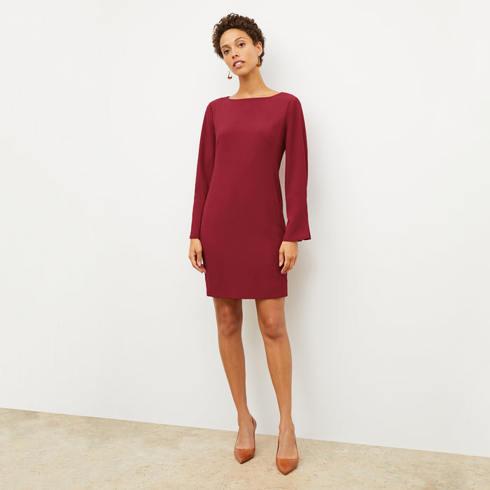 Front image of a woman wearing the regina dress in cerise | Lead