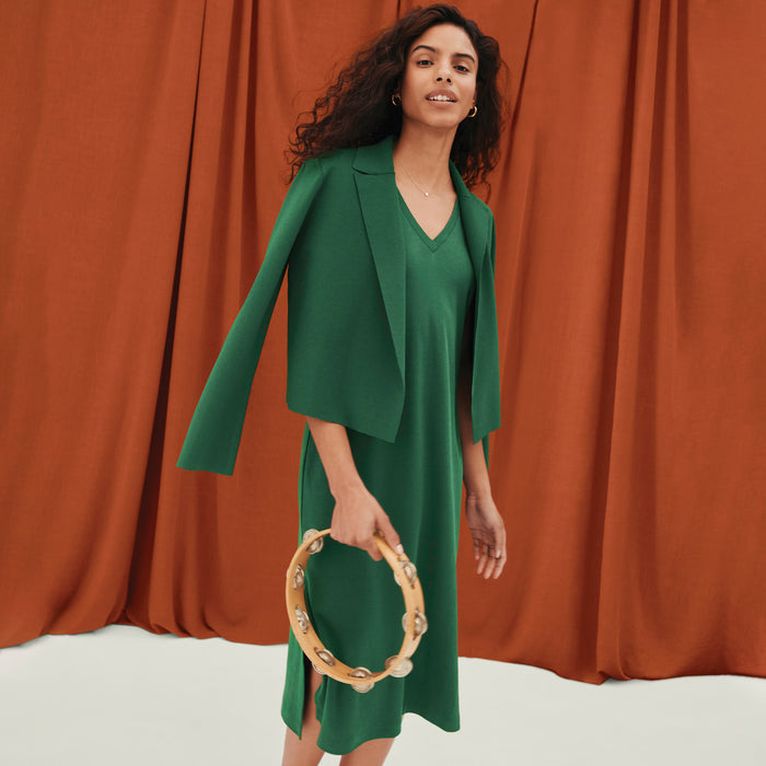 Front image of a woman wearing the renee dress in vine