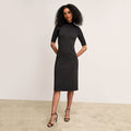 front image of a woman wearing the riya dress in black | Lead