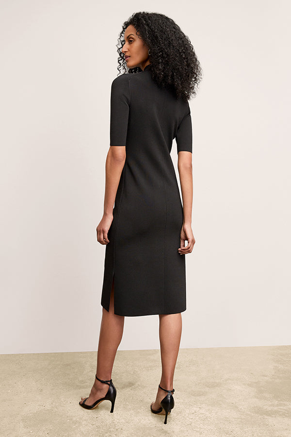 front image of a woman wearing the riya dress in black | Exclude | Grid Hover