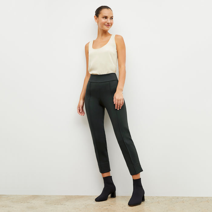 Front image of a woman wearing the robin pant in forest | Lead