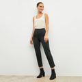 Front image of a woman wearing the robin pant in forest | Lead
