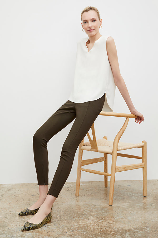 Front image of a woman wearing the Rowan flats in Black/Olive Snakeskin | Exclude | Grid Hover