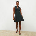 Front image of a woman wearing the ruth dress in forest | Lead