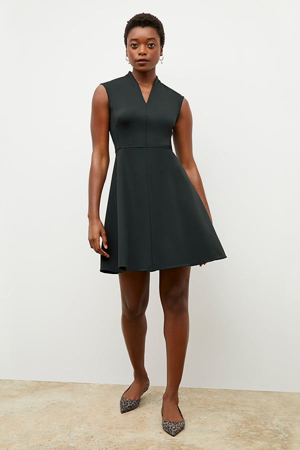 Front image of a woman wearing the ruth dress in forest | Exclude | Grid Hover