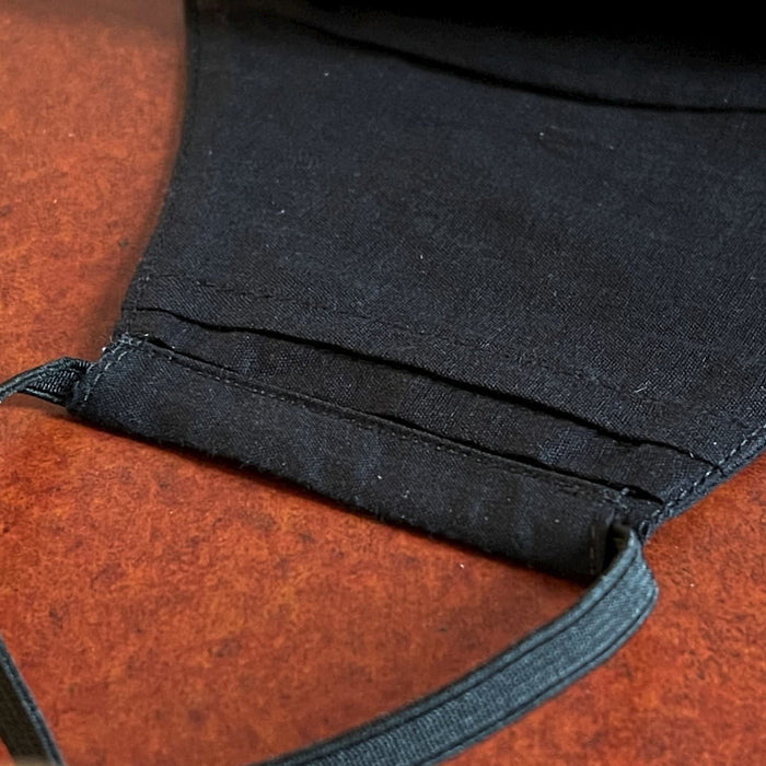 Black Cotton Face Mask has layers with a sleeve so you can insert an additional disposable filter