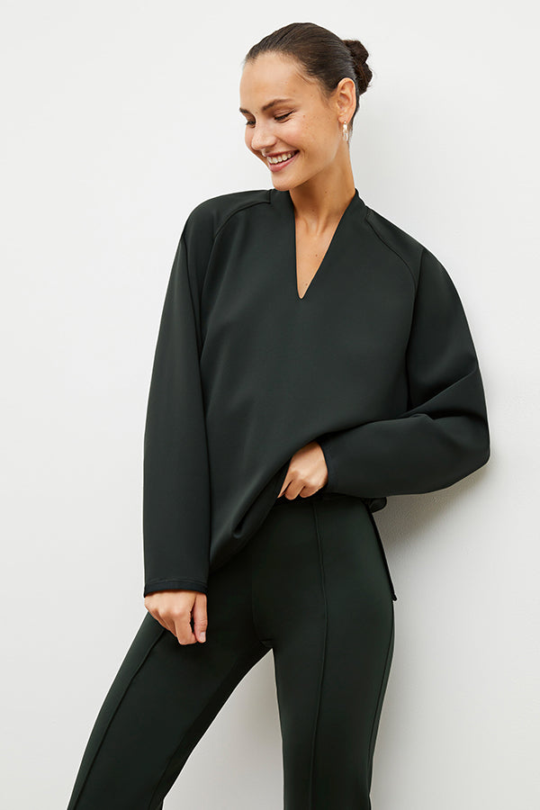 Front image of a woman wearing the shawn sweatshirt in forest | Exclude | Grid