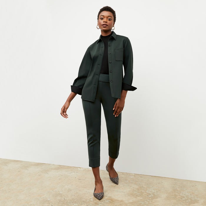 Front image of a woman wearing the sierra shacket in forest | Lead