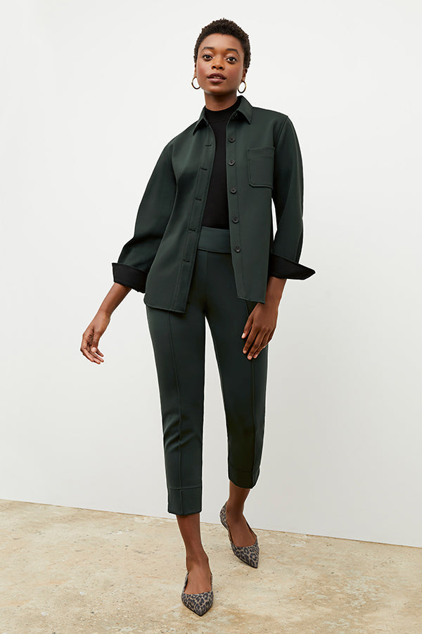 Front image of a woman wearing the sierra shacket in forest | Exclude | Grid Hover