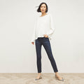 Front image of a woman standing wearing the FRAME Denim Le High Skinny Crop Jean in Samira | Lead