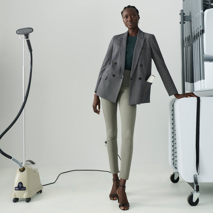 Front image of a woman wearing the skinny foster in thyme