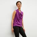 Front image of a woman wearing the Sloane top in purple jasper | Lead