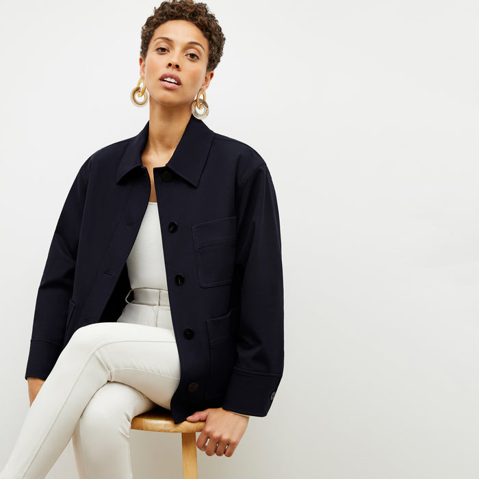 Front image of a woman wearing the steffi jacket in ink