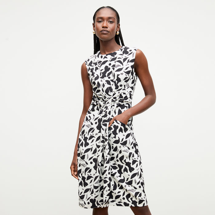 front image of a woman wearing the taylor dress in icon print | Lead