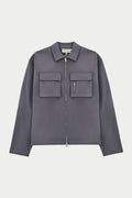 A long sleeve grey shirt with collar, chest cargo pockets, and a central zip fastening.