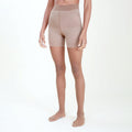 Image of a woman wearing the threads tights in sheer camel | Lead
