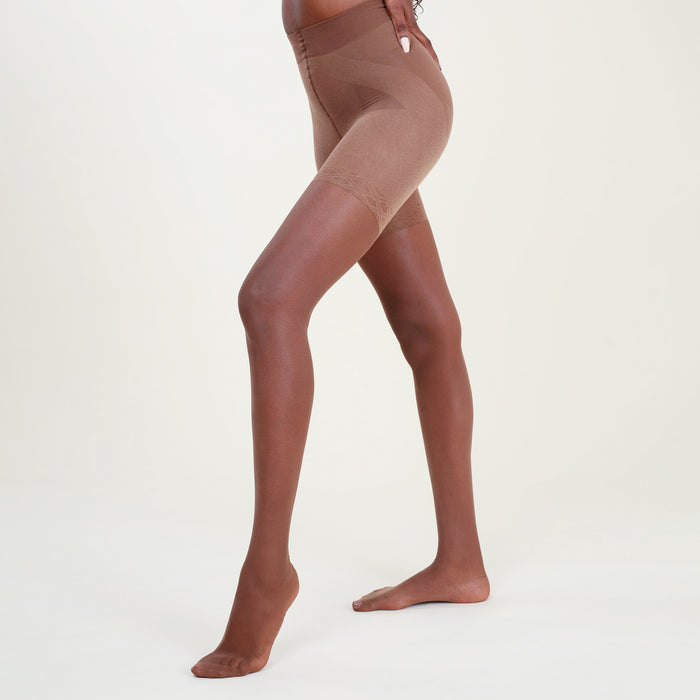 Image of a woman wearing the threads tights in sheer espresso | Lead