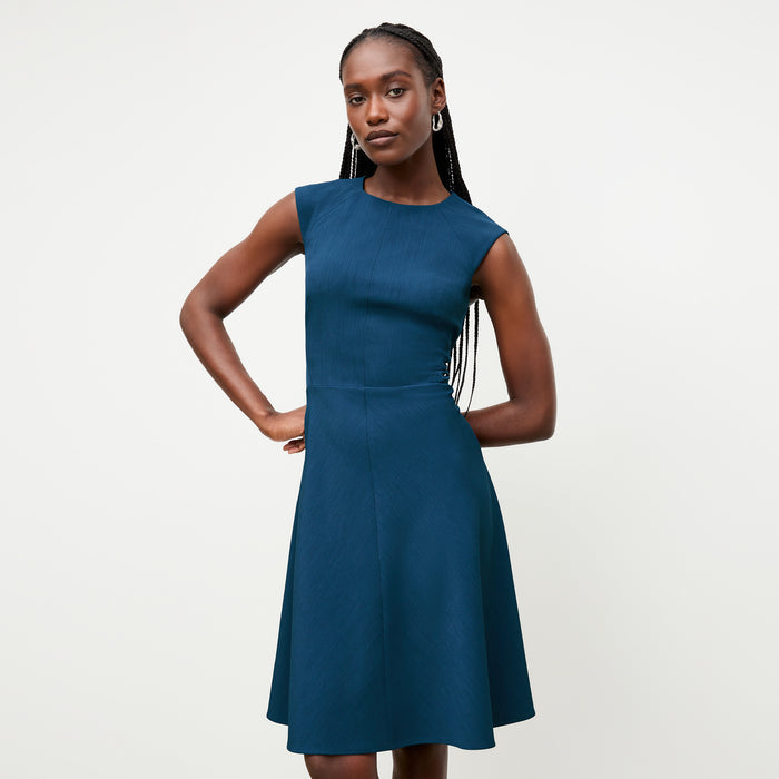 front image of a woman wearing the toi dress deep teal | Lead