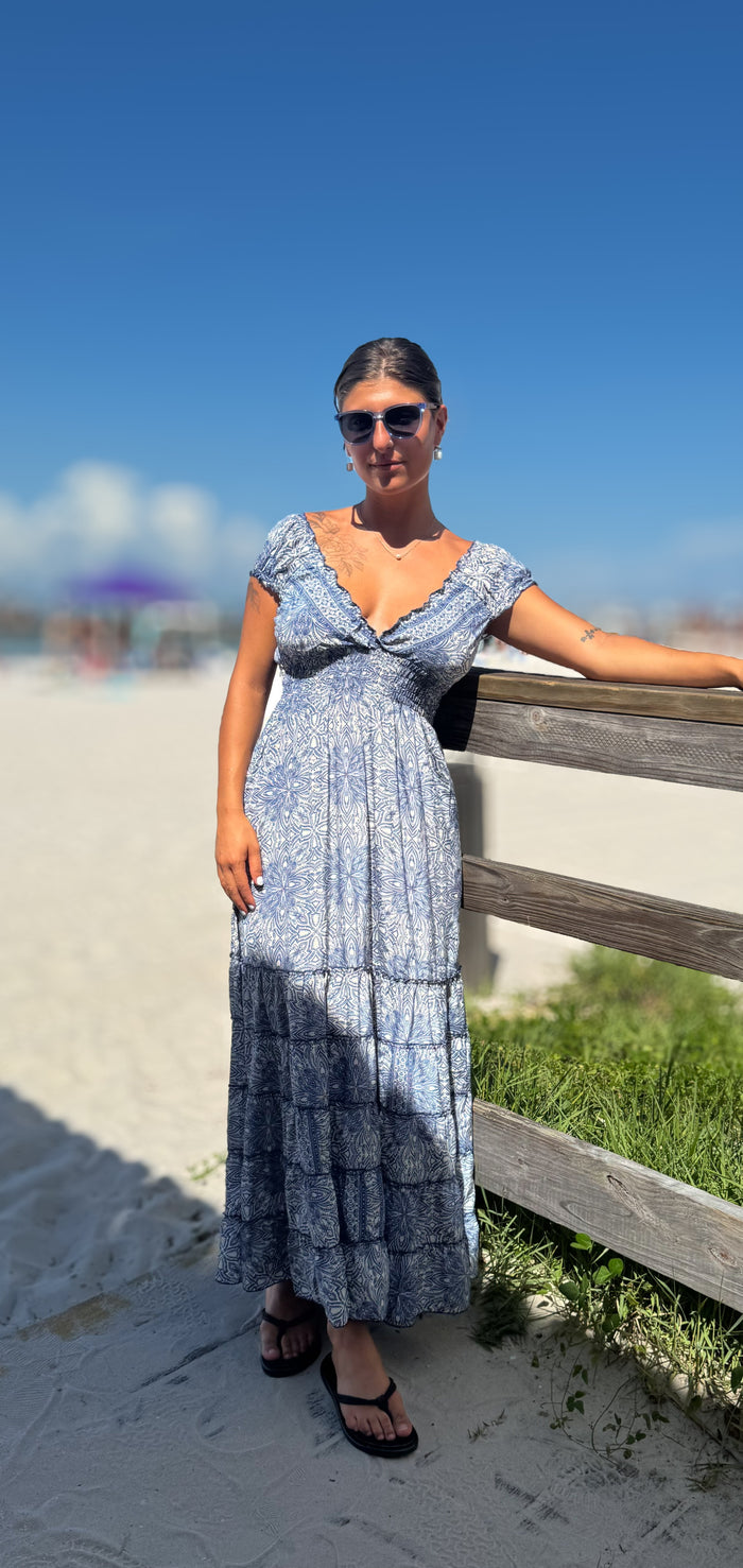 Model wearing Tucson dress in blue ivory