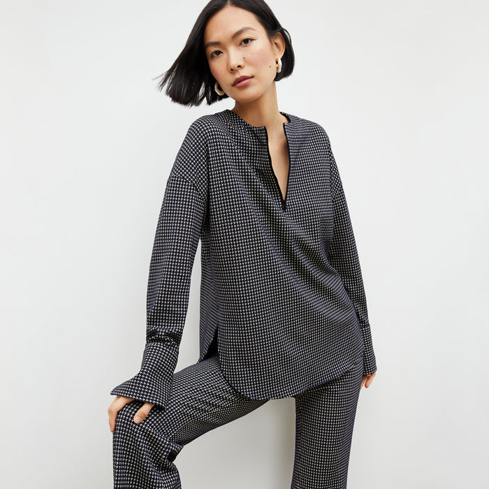 Front image of a woman wearing the tully top in black and white | Lead