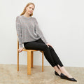 Front image of a woman wearing the Tyler Sweatshirt in Brick and Black | Lead