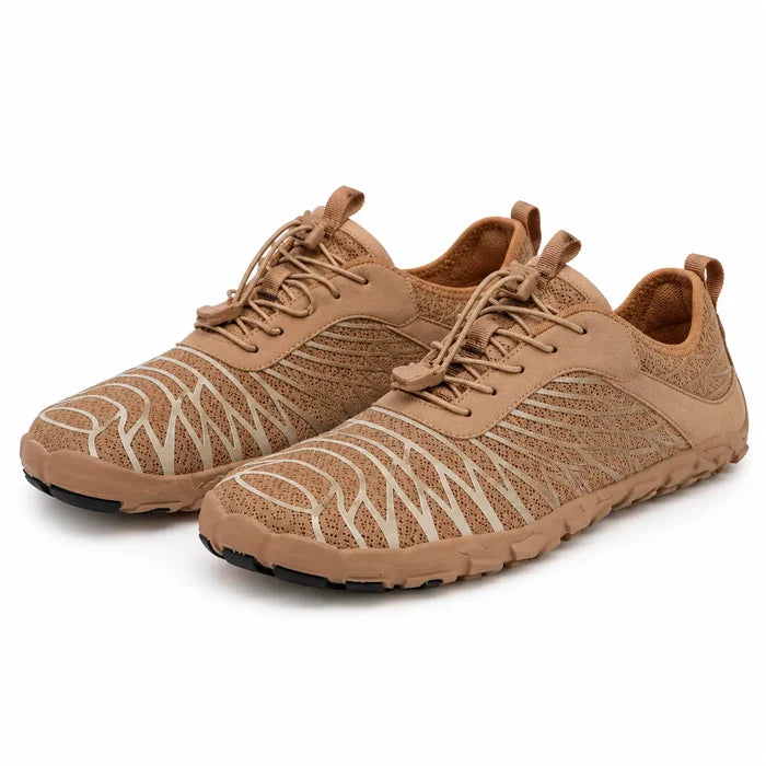 Brown unisex slip-on hiking shoes with mesh uppers and low-cut styling, shown as one pair on a clean white studio background.