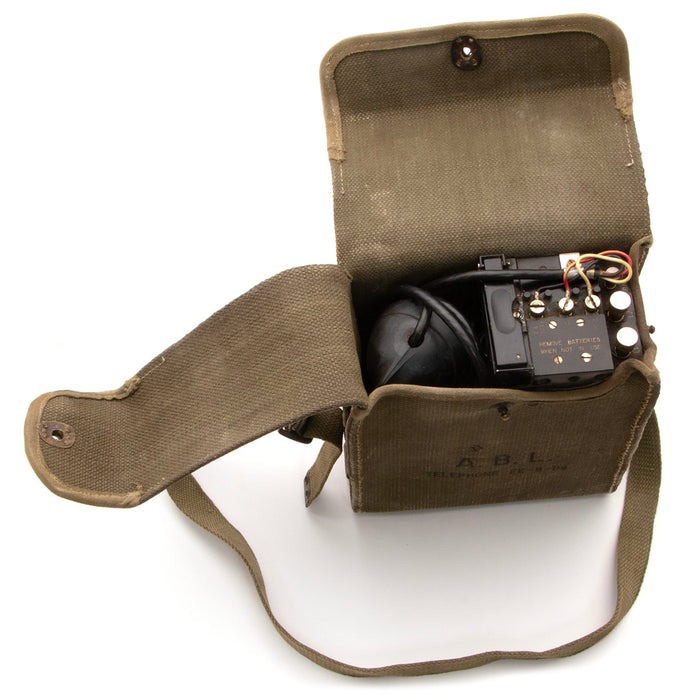 military surplus US Army Field Phone in canvas satchel
