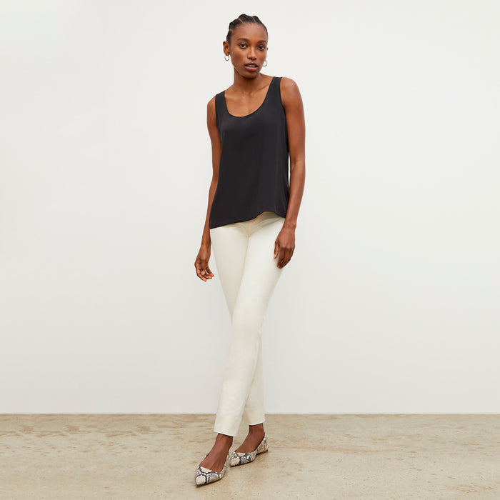 Front image of a woman wearing the Vicky Tank in Black
