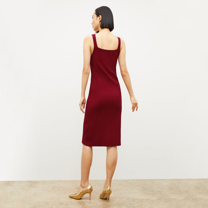 Back image of a woman wearing the vincent dress in maroon
