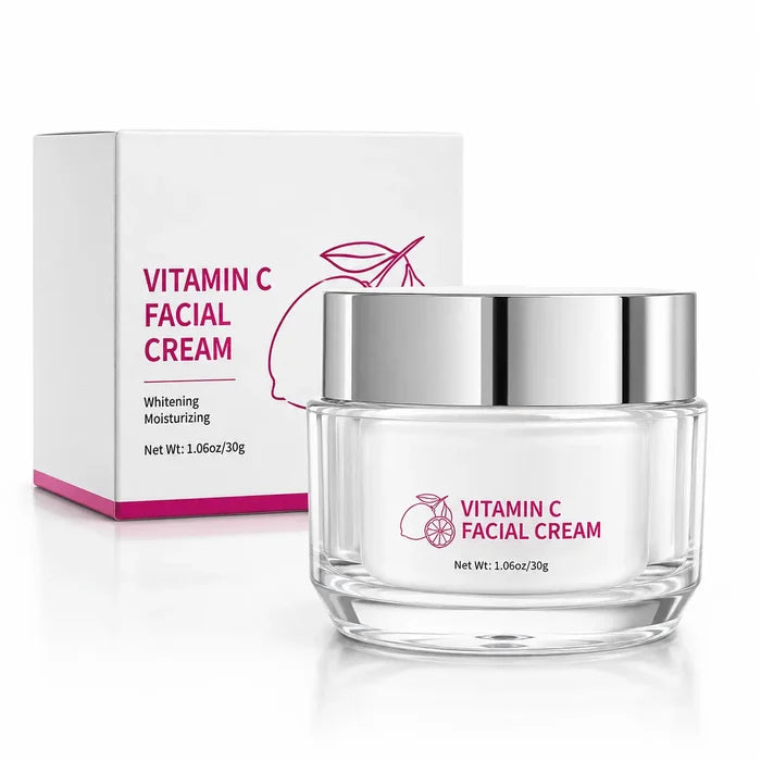Close-up professional packshot of Vitamin C Facial Cream 30g jar, clear base, silver lid and matching white carton.