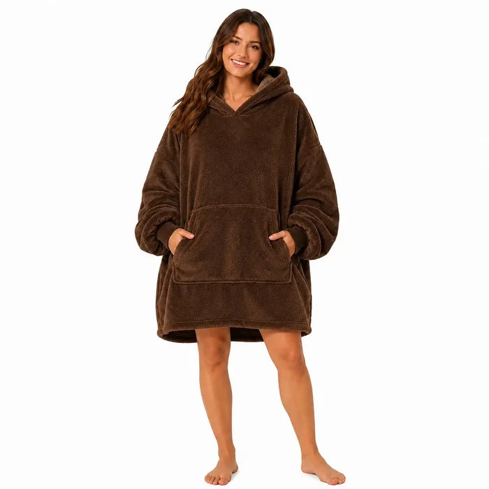 Coffee Brown wearable blanket hoodie with hood and large front pocket modeled by a woman on a clean white studio background.