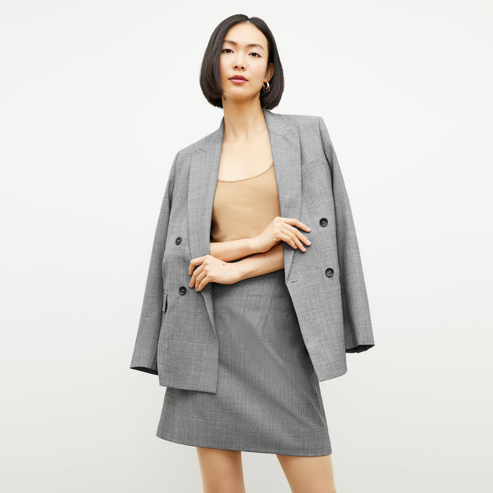 Front image of a woman wearing the Whitney Skirt in Black / White
