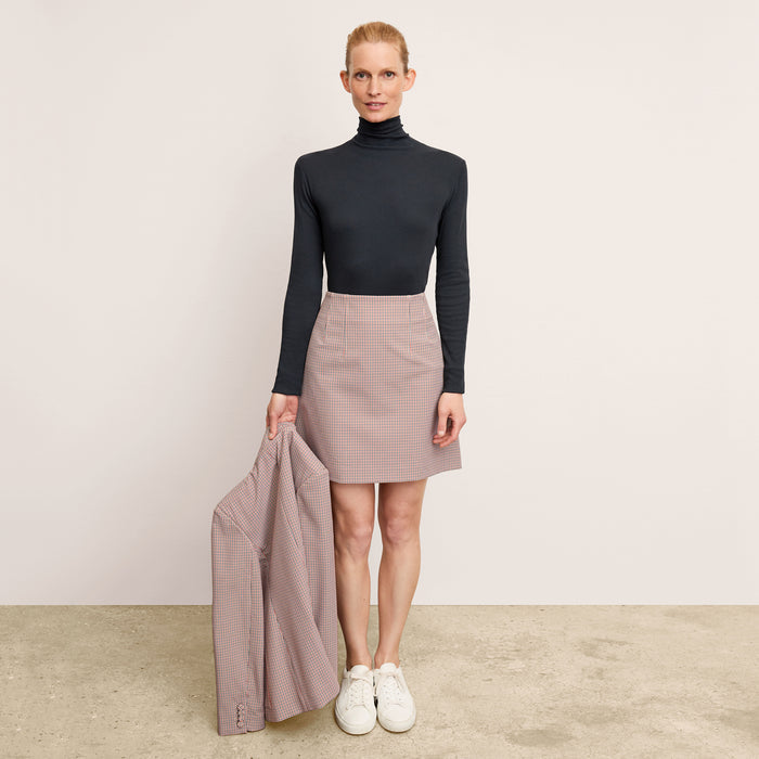 Front image of a woman wearing the Whitney Skirt in Stretch Twill in Mini Check