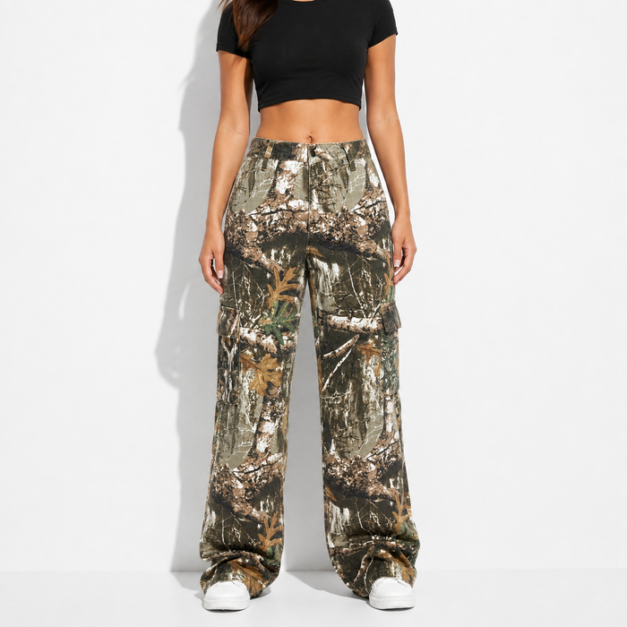 Women's high-waist camouflage cargo pants front view with long wide legs and clear pocket detail for clear product reference.