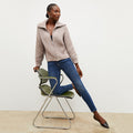 Front image of a woman wearing the william sweater in barley | Lead