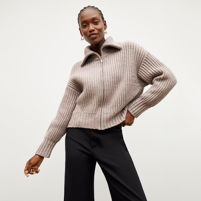 Front image of a woman wearing the william sweater in barley
