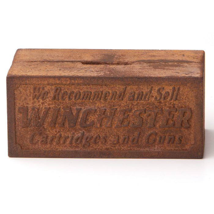 Each side of replica Winchester Cast Iron Bank has â€œWe Recommend and Sell WINCHESTER Cartridges and Gunsâ€ in raised lettering