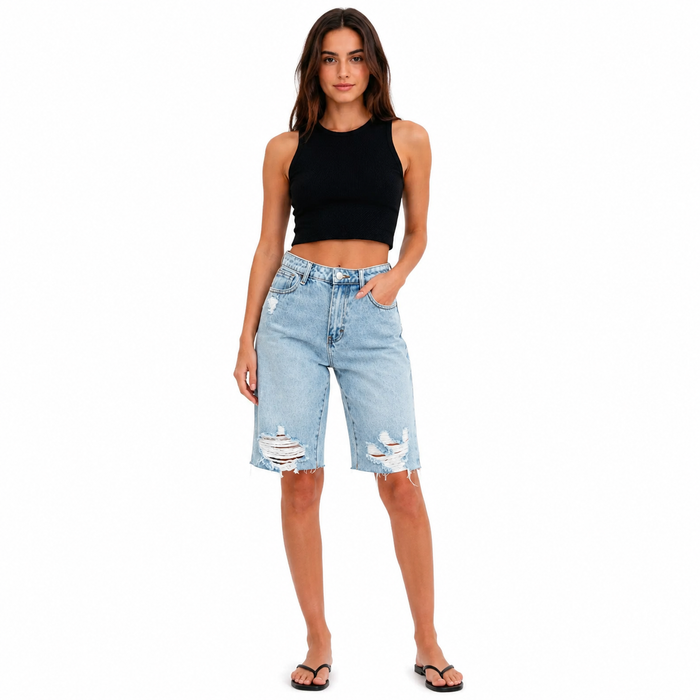 Women's distressed denim Bermuda shorts, front view on a professional model against white background