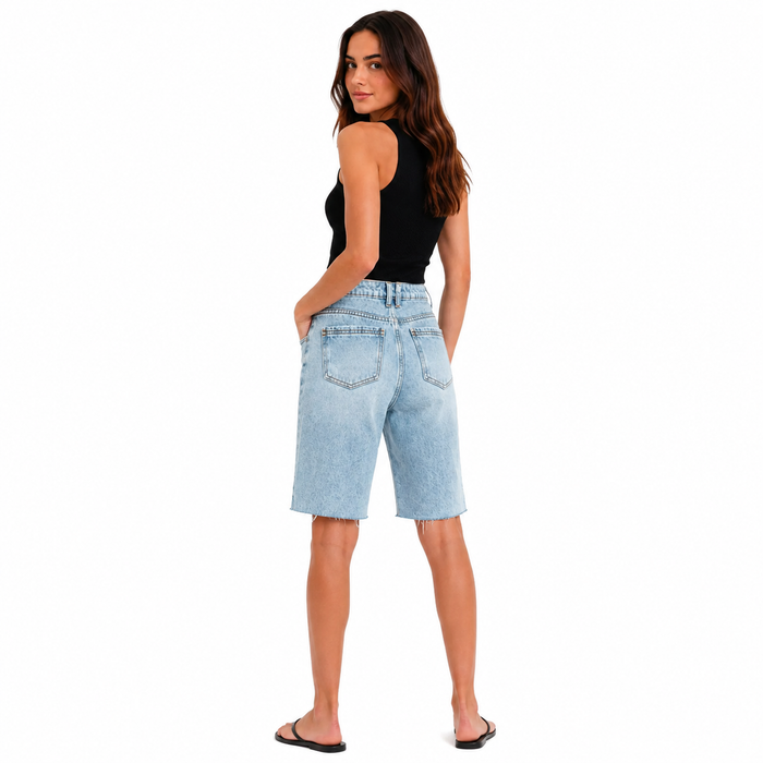 Women's light-blue denim Bermuda shorts, back view showing pockets and raw hems