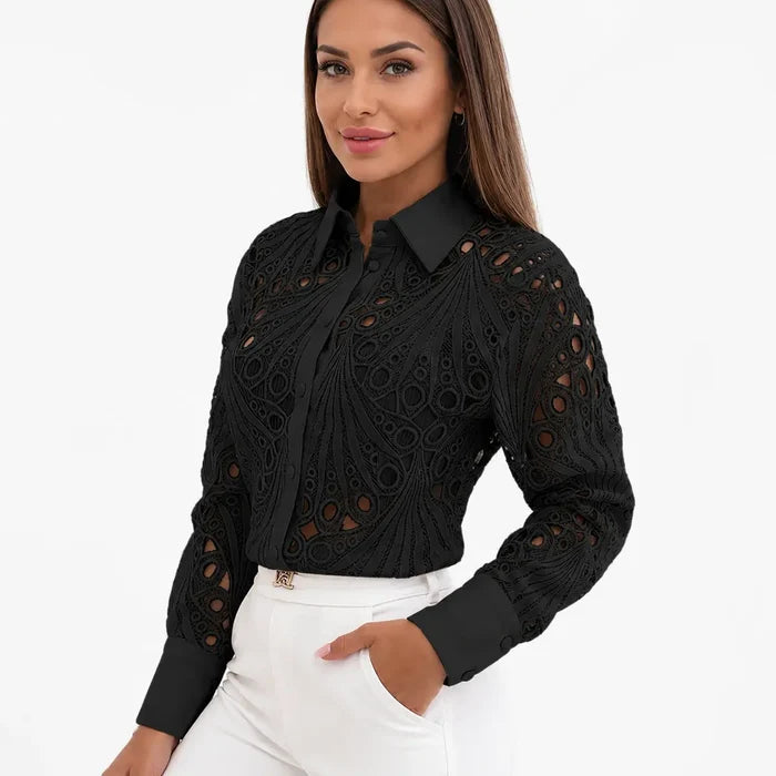 Close view of women's black lace hollow-out shirt showing the button front, pointed collar, cuffs and sleeve details clearly.