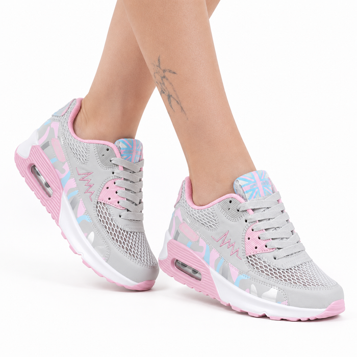 Women's running shoes gray and pink variant close-up showing mesh upper and sole details.