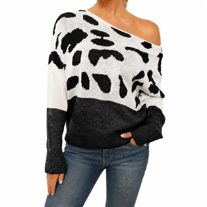 Women's Black and Gray one shoulder leopard print sweater in a three-quarter studio view showing drape and sleeves.