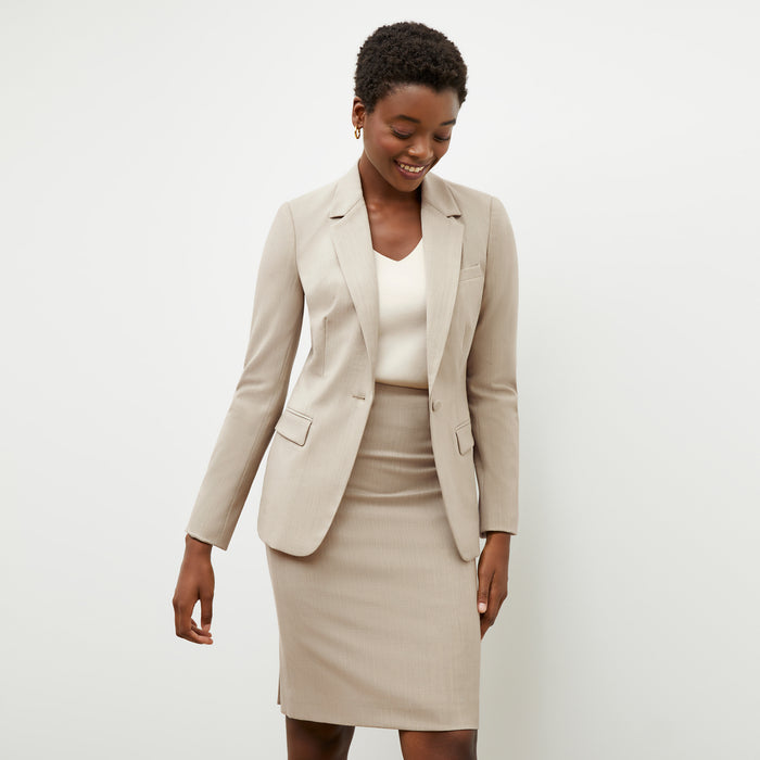 Front image of a woman wearing the Yiyan Blazer in Natural Melange