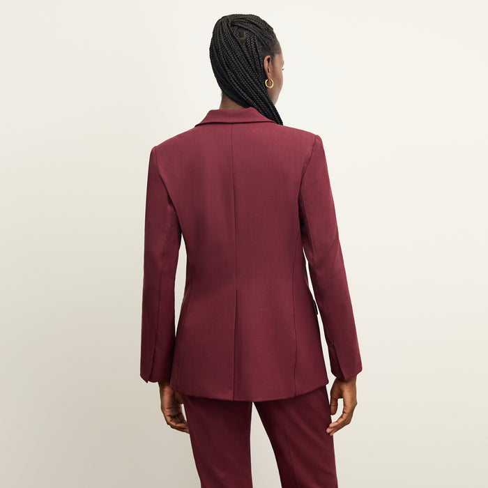 back image of a woman wearing the yiyan blazer in shiraz