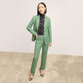 front image of a woman wearing the yiyan blazer in parisian green | Lead